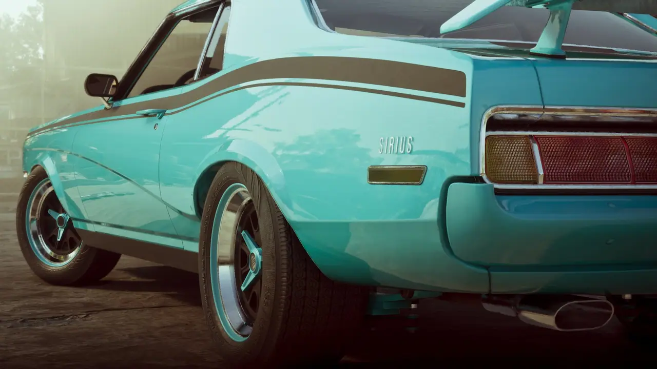 Side view of the exterior of a turquoise muscle car.
