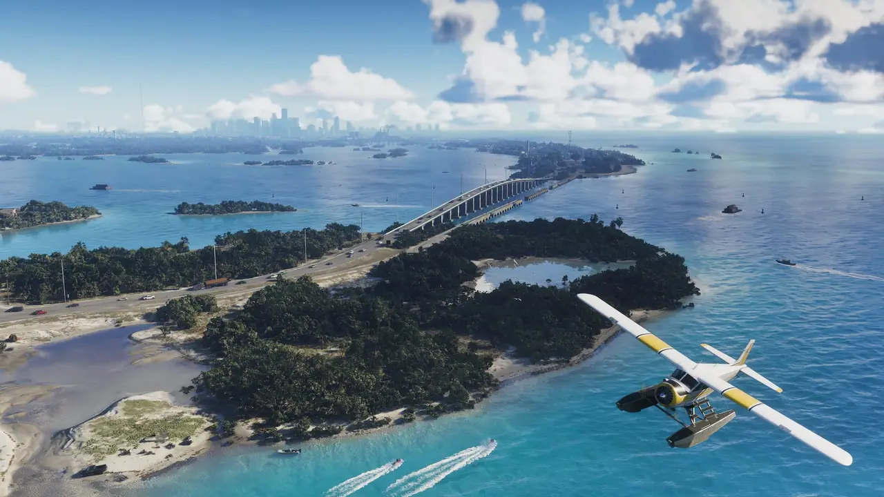 A seaplane flying over water in the Leonida Keys. In the background a bridge with cars connects two islands.