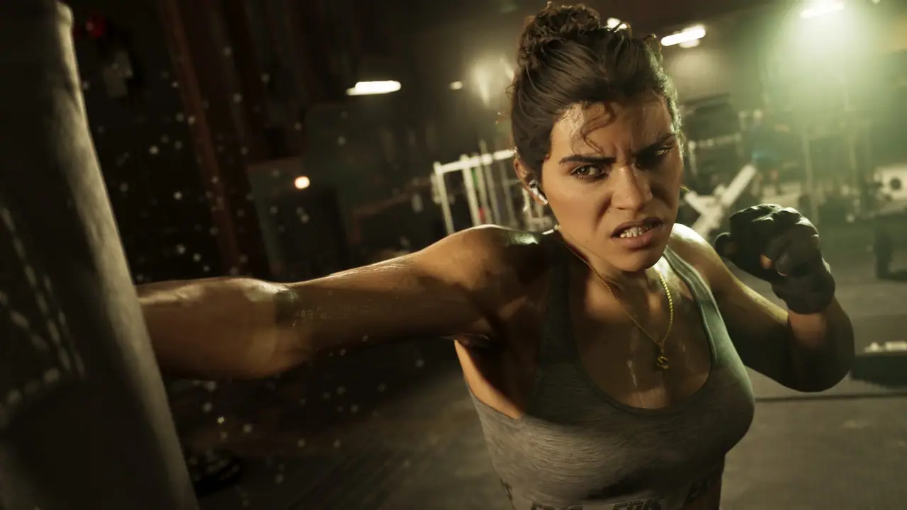 Lucia punching a heavy bag in a gym.