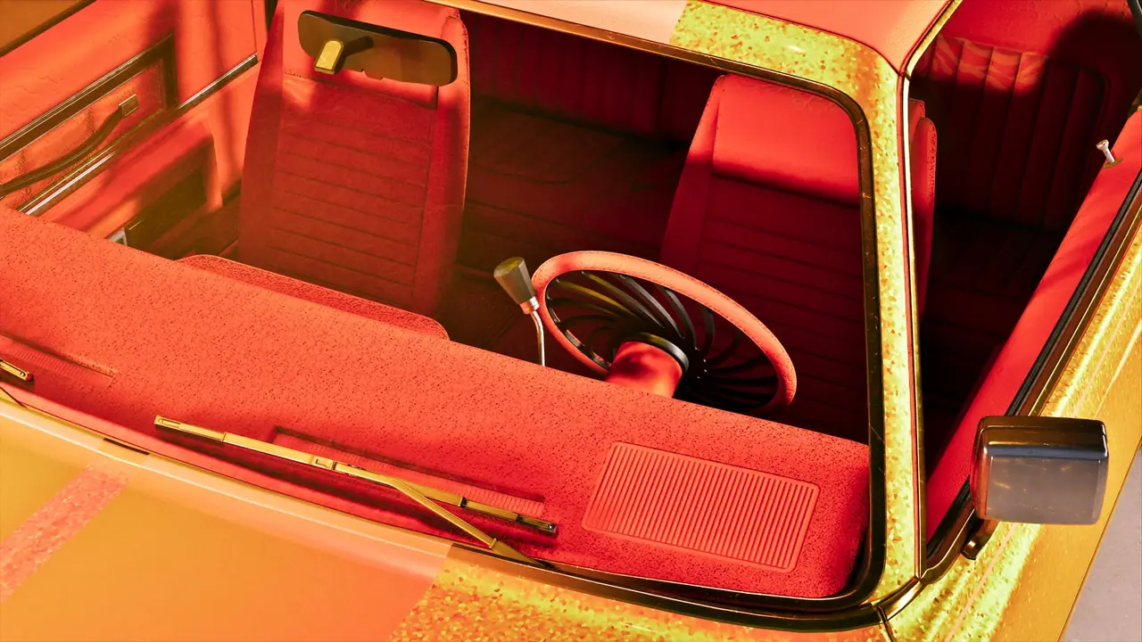Close up shot of the windshield and front interior of a gold custom vehicle.