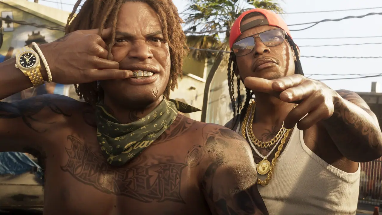 A man in Vice City pulls back his lip showing off his grill while another man next to him points two fingers forward.
